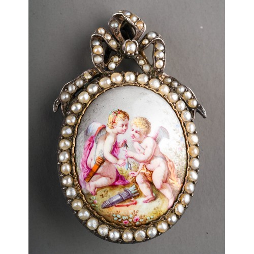 90 - A continental silver brooch, set with a painted porcelain panel depicting cupids, in a seed pearl bo... 