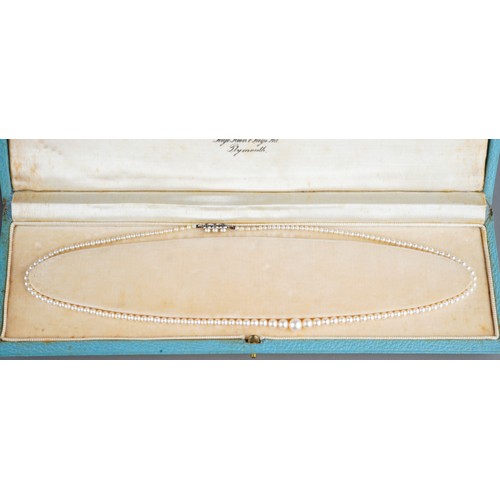 96 - A cultured pearl single-row necklace, with graduated pearls 4.3mm to 8.7mm, with an 18ct yellow gold... 