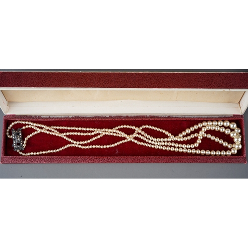 96 - A cultured pearl single-row necklace, with graduated pearls 4.3mm to 8.7mm, with an 18ct yellow gold... 