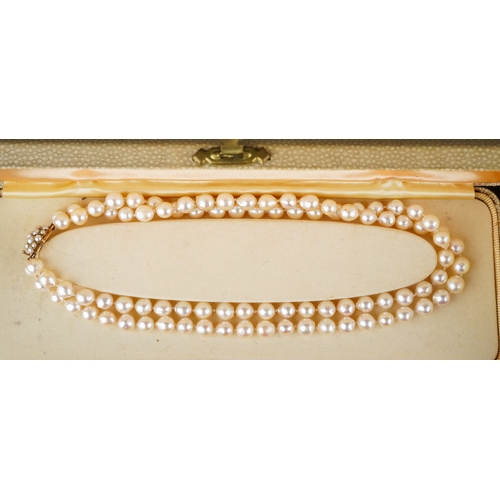 96 - A cultured pearl single-row necklace, with graduated pearls 4.3mm to 8.7mm, with an 18ct yellow gold... 