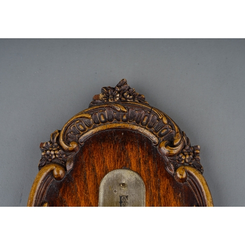 97 - A 20th Century Gilbey's Spey-Royal Whiskey wall thermometer, with carved borders, approx 34cm long