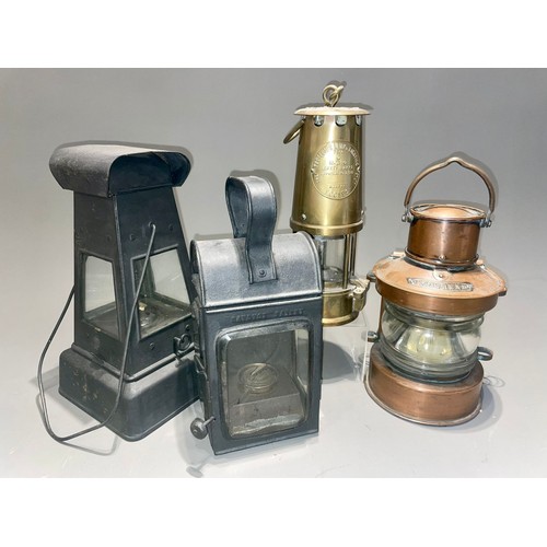 125 - An Eccles Type 6 M & O miner's lamp together with a Meteor Masthead ships lantern and two tin variou... 