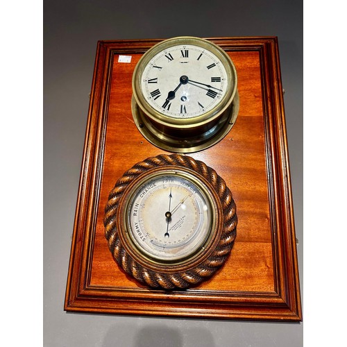 130 - A mounted brass Ship's clock and wooden mounted barometer together with a Modern brass and green gla... 