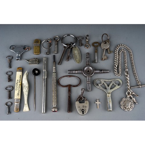 132 - An early 20th Century silver Albert chain, hallmarked approx .88 grams together with various keys, p... 