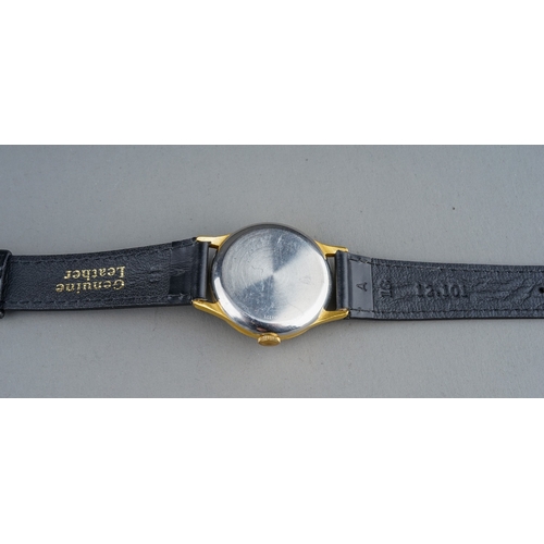 171 - A gentleman's Smiths De Luxe gold plated wristwatch, 29mm circular black dial with baton indicators,... 