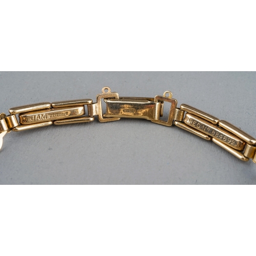 175 - A ladies Accurist 9ct yellow gold wristwatch, 9ct gold strap, total gross weight approx 12.2g