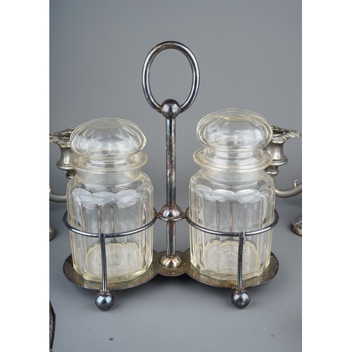 187 - Collection of epns to include Walker and Hall double glass jar stand, 2 candle sticks, condiment set... 