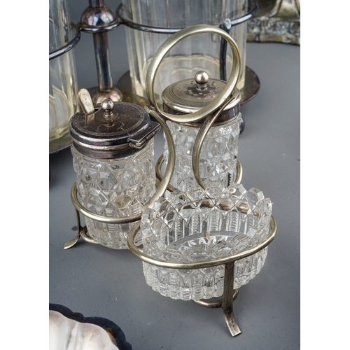 187 - Collection of epns to include Walker and Hall double glass jar stand, 2 candle sticks, condiment set... 