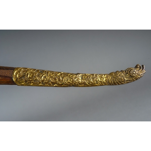 237 - Antique Turkish Yatagan Kard dagger.  Wooden scabbard with gilt metal fittings, length 43cm