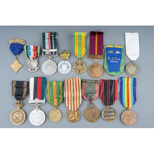 245 - A collection of World Medals.  15 in total, France, Belgium, Pakistan etc.  Conditions VF+