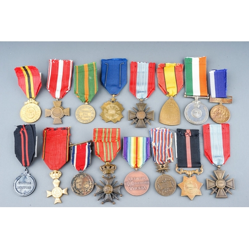 246 - A Collection of World Medals 16 in total.  French, Belgian, Pakistani, Italian etc.  Conditions VF+