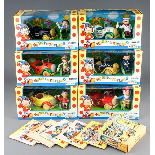 263 - A collection of six Corgi Noddy in Toyland model cars, all boxed together with card Shop of Books