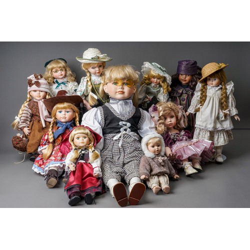 297 - A collection Modern decorative dolls and associated furniture