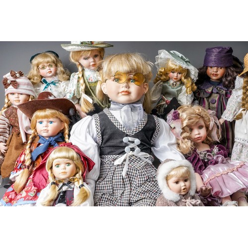 297 - A collection Modern decorative dolls and associated furniture