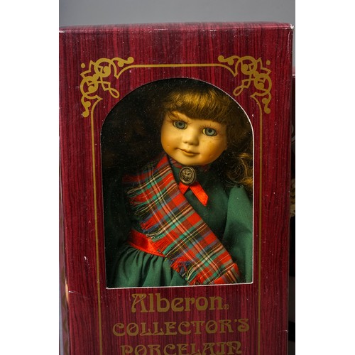 297 - A collection Modern decorative dolls and associated furniture