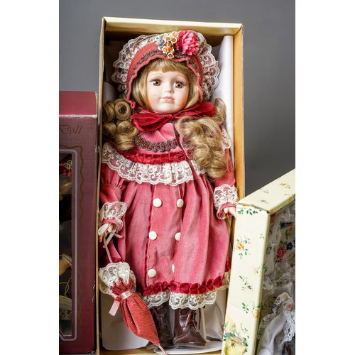 297 - A collection Modern decorative dolls and associated furniture