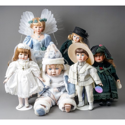 297 - A collection Modern decorative dolls and associated furniture