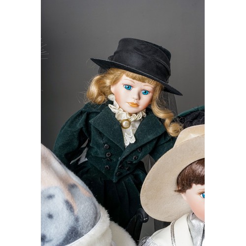 297 - A collection Modern decorative dolls and associated furniture