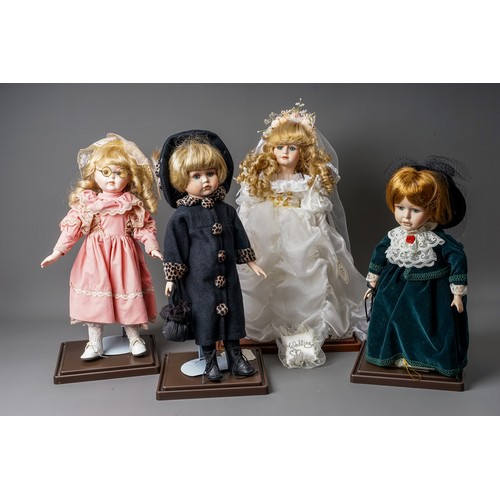 297 - A collection Modern decorative dolls and associated furniture