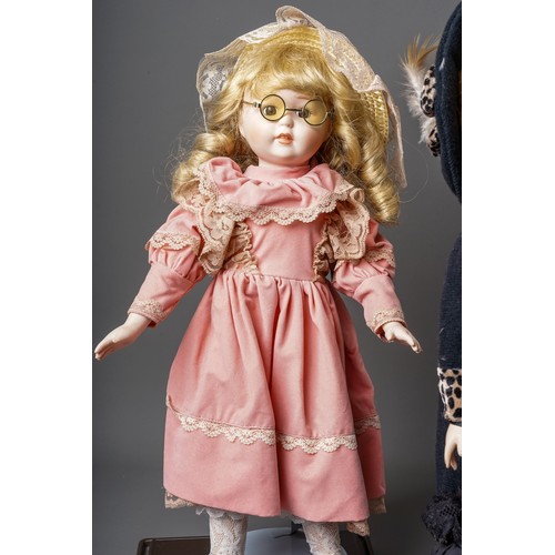 297 - A collection Modern decorative dolls and associated furniture