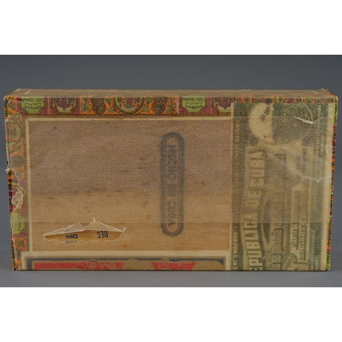 318 - A sealed box of twenty-five Punch Manuel Lopez Petit Corona handmade Cuban cigars, dated December 19... 