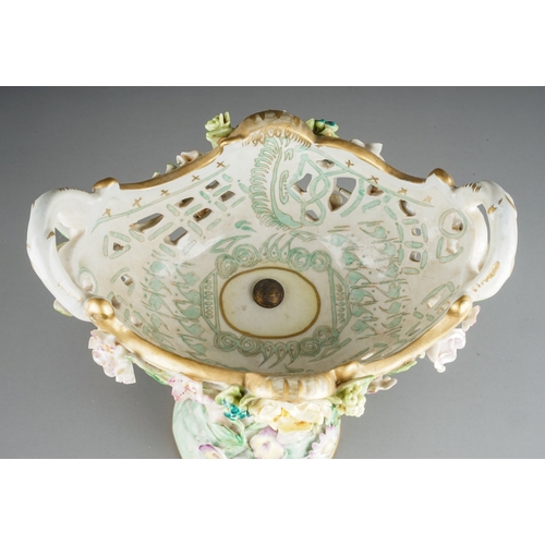 332 - An early 20th Century German Meissen style porcelain two handled table centre piece, oval pierced ba... 