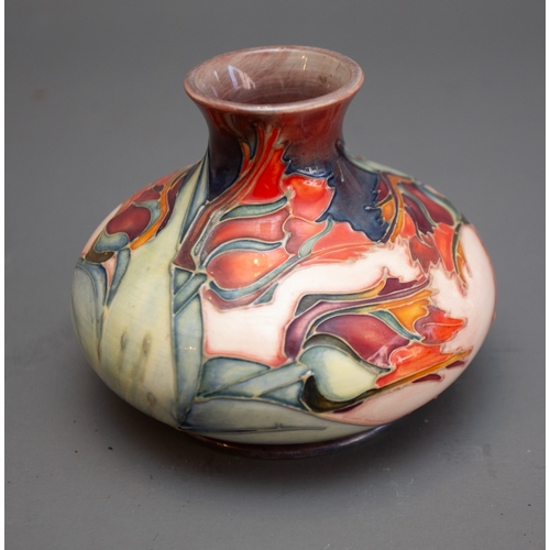 349 - A Moorcroft Red Tulip squat vase with WM monogram and printed marks to base, 11cm high.