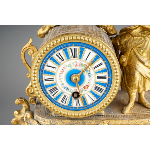 352 - A French gilt spelter porcelain mounted mantle clock, the drum movement with Sevres style dial Roman... 