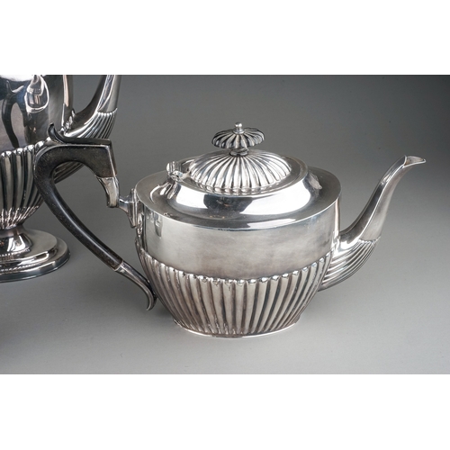 379 - A matched Georgian style silver four piece tea and coffee service comprising teapot, coffee pot, sug... 