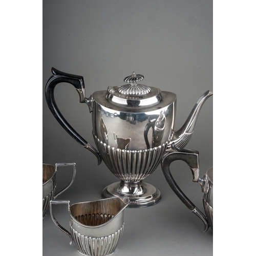 379 - A matched Georgian style silver four piece tea and coffee service comprising teapot, coffee pot, sug... 