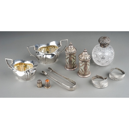 382 - A group of silver to include: Edwardian monogrammed milk jug and sugar bowl, by Robert Pringle, Lond... 