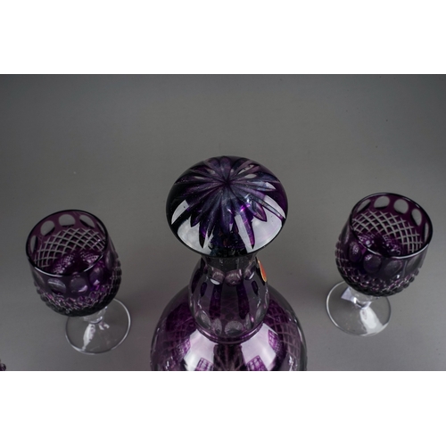 383 - A set of six Sapska Fabrika Stakla Paracin amethyst wine glass with matching decanter and stopper (7... 