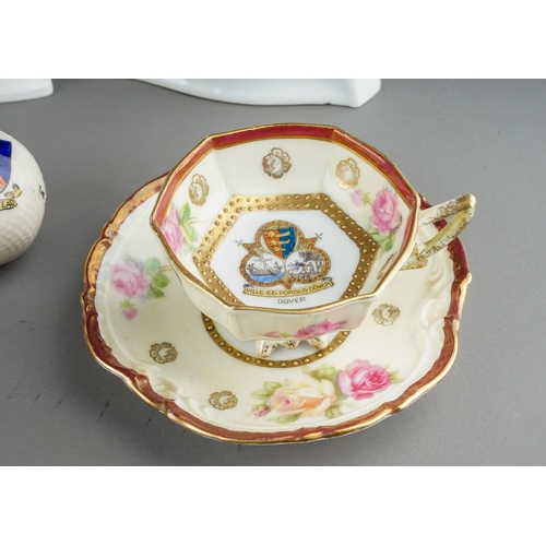 384 - A collection of Crested ware to include: Margate ashtray, Hemel Hempstead golf ball, pair of cabinet... 