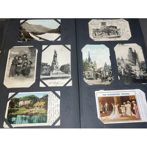 398 - Three early 20th Century postcard albums; Edwardian, War Time and later, one containing coloured or ... 