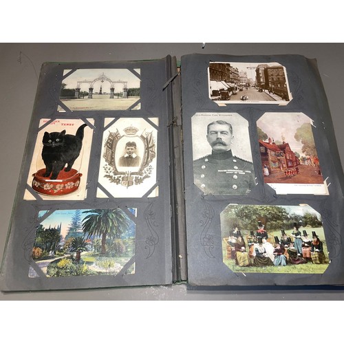 398 - Three early 20th Century postcard albums; Edwardian, War Time and later, one containing coloured or ... 