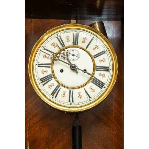 410 - A mahogany cased Viennese regulator, cream dial with Roman Numerals and subsidiary dial, turned pila... 