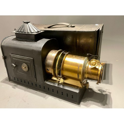 412 - A late 19th Century tin plate and brass magic lantern with Stocks patent lamp, in tinplate carrying ... 