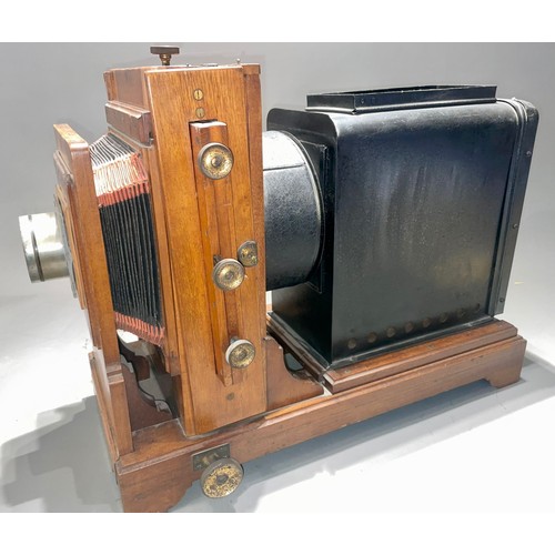 413 - An early 20th Century tin plate camera / lantern with an Emil Busch Anastigmat Glaukar F 3 No 4 F=5 ... 