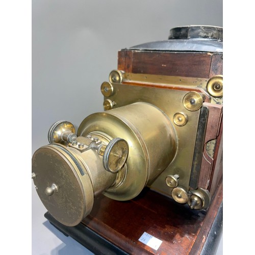 420 - An early 20th Century mahogany and brass magic lantern