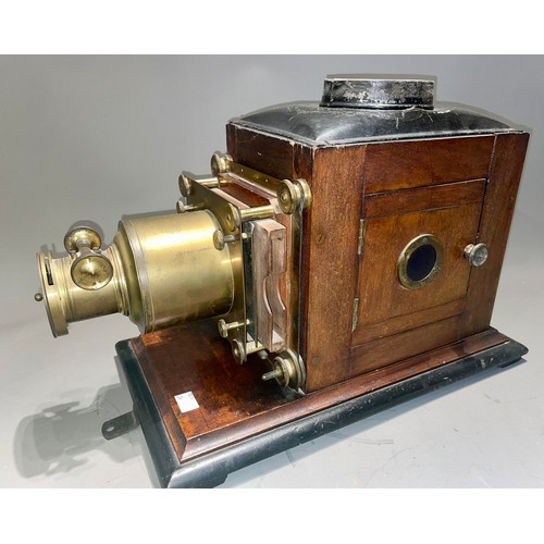 420 - An early 20th Century mahogany and brass magic lantern