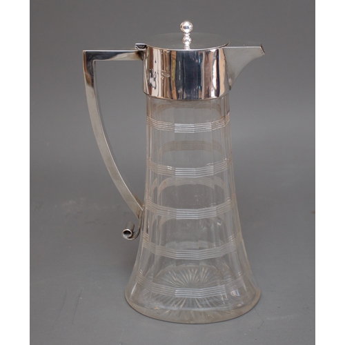 423 - A late Victorian silver mounted cut glass claret jug, tapering oval facet body with cut bands and st... 