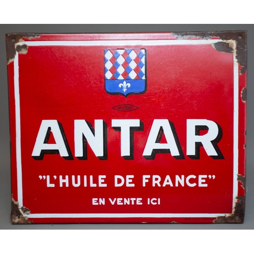 445 - An early 20th century French enamel advertising sign for Antar, with red ground and white lettering,... 