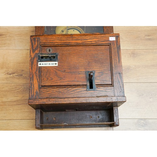 452 - The Gledhill Brook Time Recorders Ltd: an early 20th century oak cased clocking-in clock, number 658... 