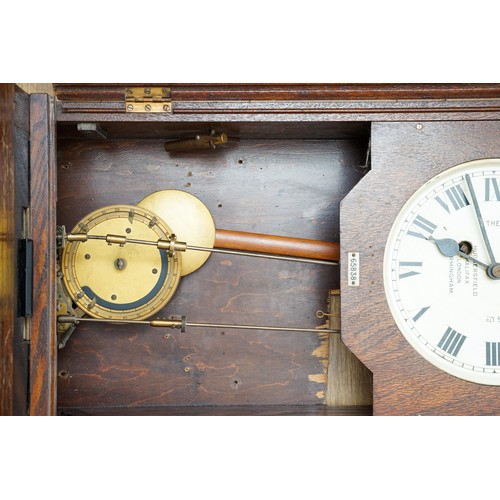 452 - The Gledhill Brook Time Recorders Ltd: an early 20th century oak cased clocking-in clock, number 658... 