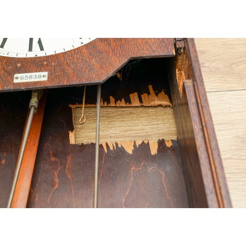 452 - The Gledhill Brook Time Recorders Ltd: an early 20th century oak cased clocking-in clock, number 658... 