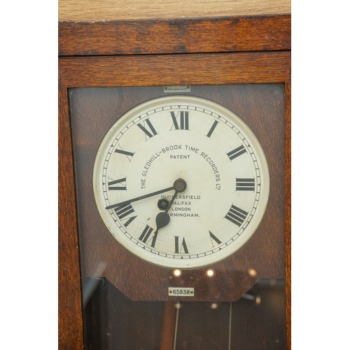 452 - The Gledhill Brook Time Recorders Ltd: an early 20th century oak cased clocking-in clock, number 658... 