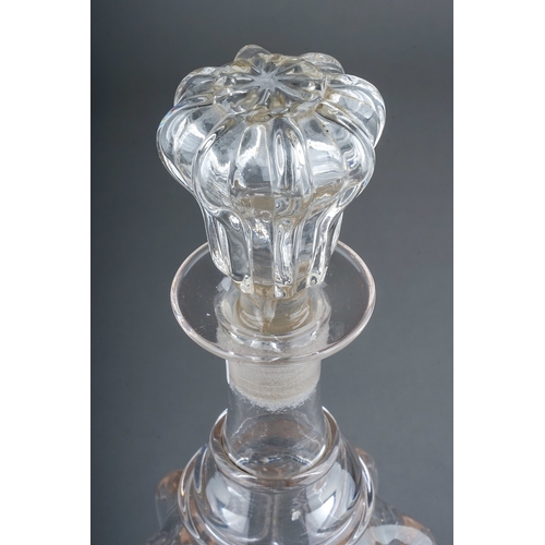 505 - An Art Nouveau style glass decanter, the side applied with eight high relief straps, with matching s... 