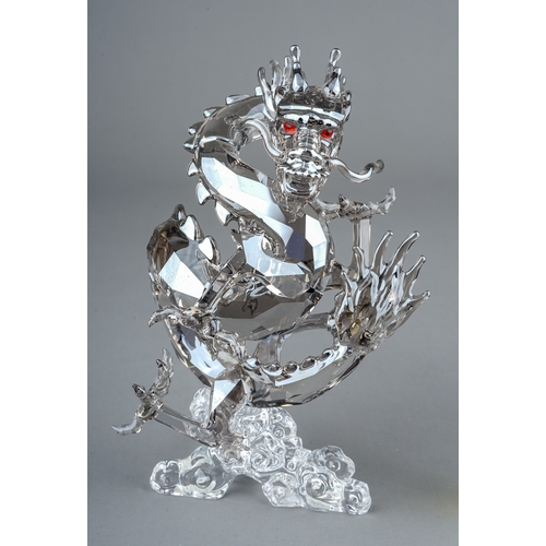 582 - Three Swarovski Crystal Society models to include: prancing Horse; Chinese Year of the Dragon 2012 a... 