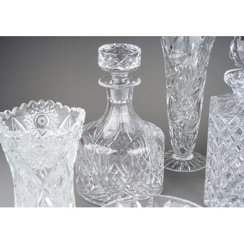 584 - Assorted cut and moulded glass to include painted cup and saucer, decanters and stoppers, bowls, vas... 