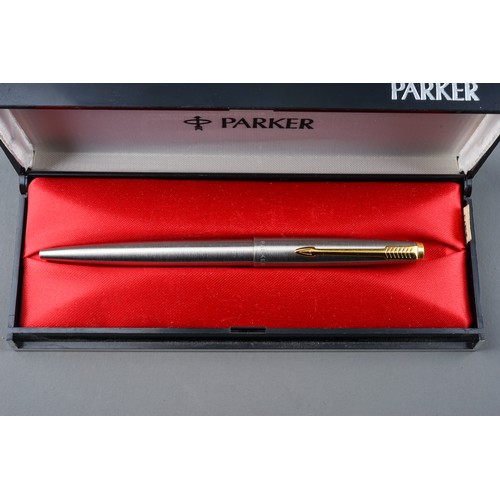 591 - A Sheaffer fountain pen, 14k gold nib, boxed; a Sheaffer roller ball pen, boxed; a parker ball point... 